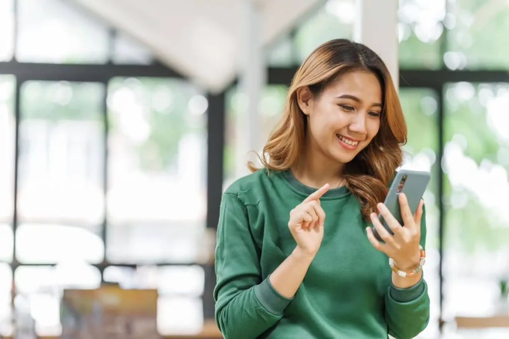 Woman studying online RBS training materials on her laptop.
